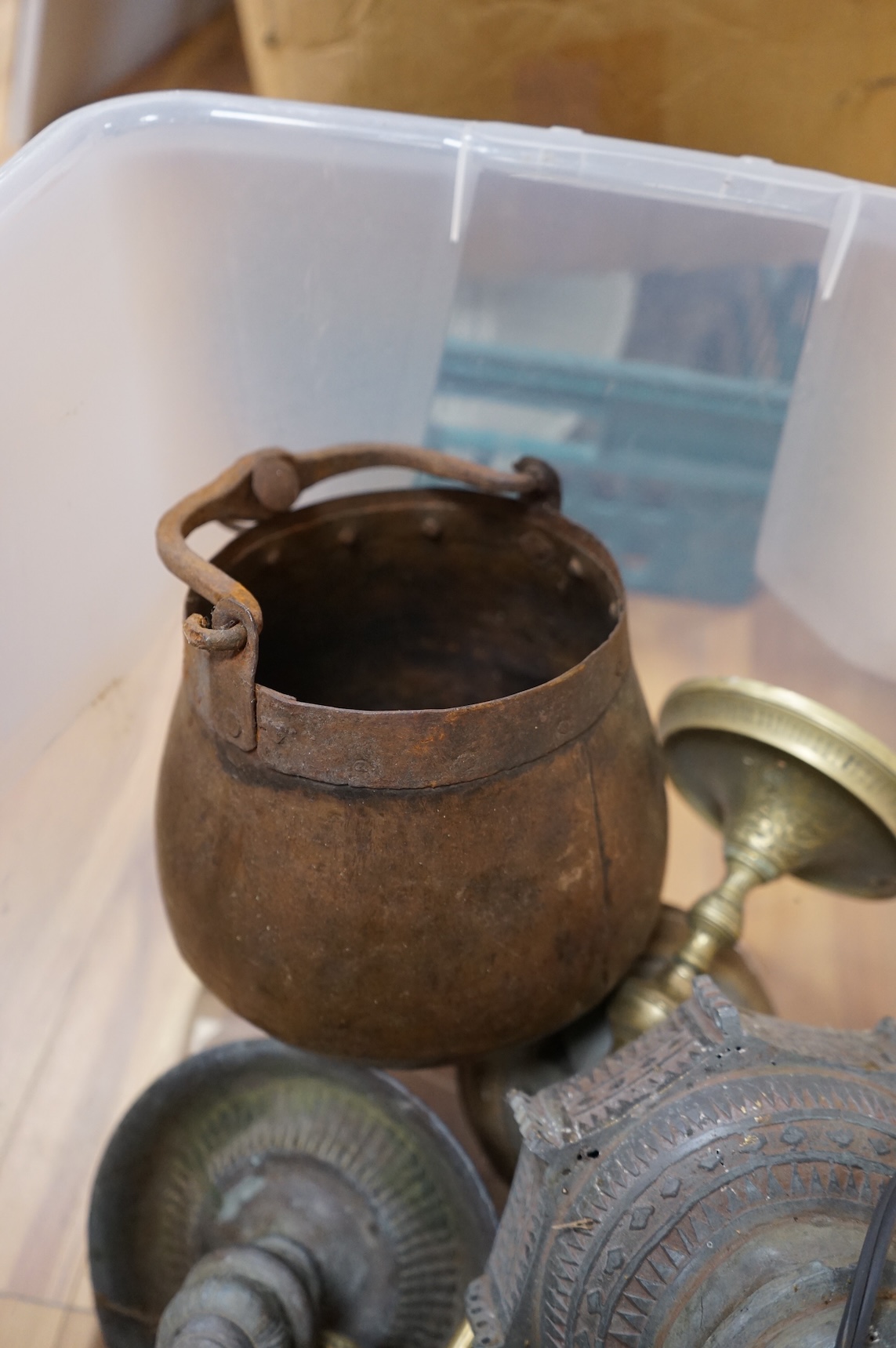 A collection mixed metal ware to include table lamps planters and a pestle and mortar